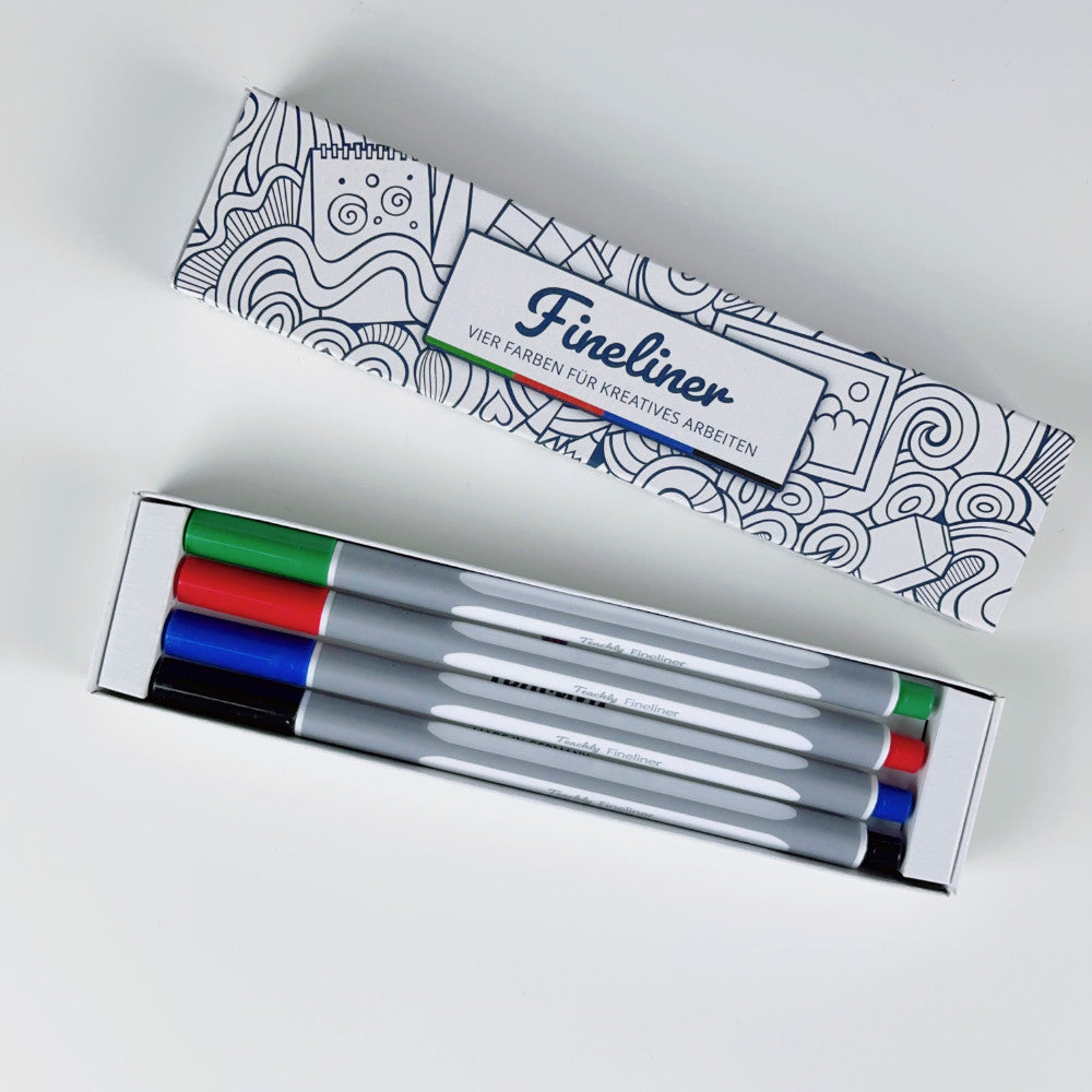 Ergonomisches Teachly Fineliner Set Basic Colors mit den Schreibfarben rot, grün, blau und schwarz verpackt in einer schönen Geschenk-Schachtel.