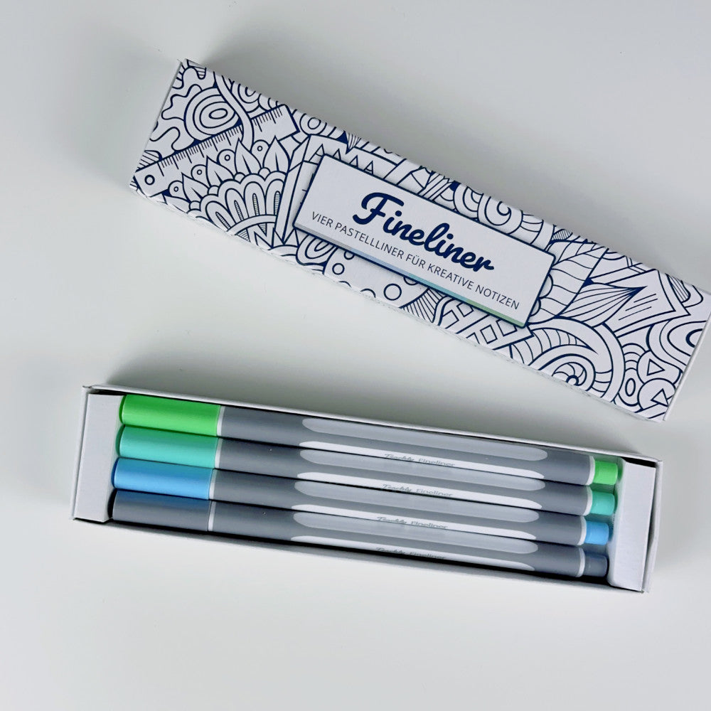 Geöffnete Teachly Fineliner Ocean Verpackung mit vier Stiften in den Farben Grau, Hellblau, Türkis & Mint